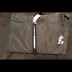 Gently used Disney world rain coat w/ Mickey logo